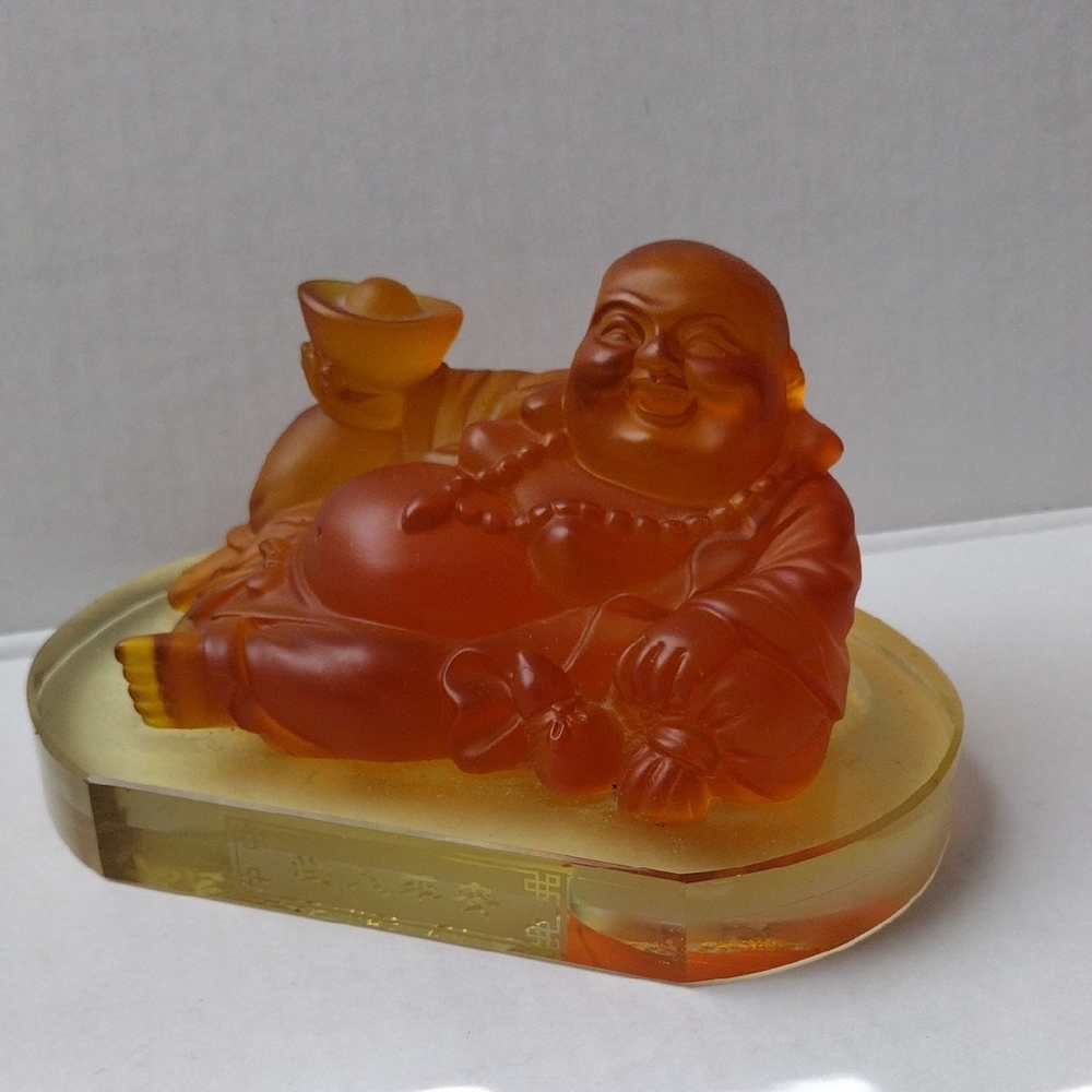 Orange Buddha Figurine